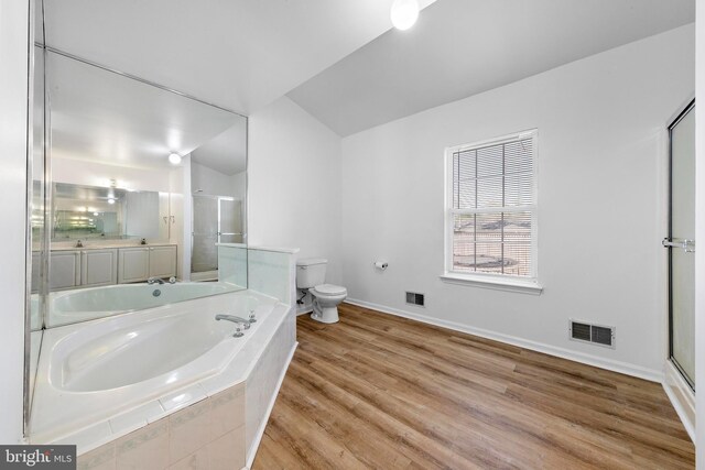 316 Nautilus Dr, Manahawkin, NJ 08050 - bathroom with baseboards, a shower stall, toilet, a garden tub, and wood finished floors