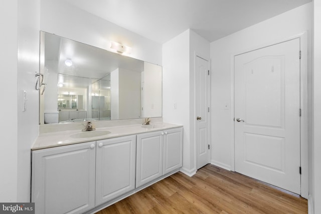 316 Nautilus Dr, Manahawkin, NJ 08050 - bathroom with wood finished floors and double vanity