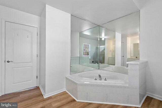 316 Nautilus Dr, Manahawkin, NJ 08050 - full bath featuring baseboards, wood finished floors, and a garden tub