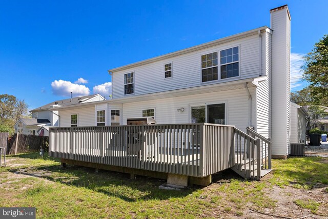 316 Nautilus Dr, Manahawkin, NJ 08050 - rear view of property featuring a chimney, central air condition unit, and a wooden deck