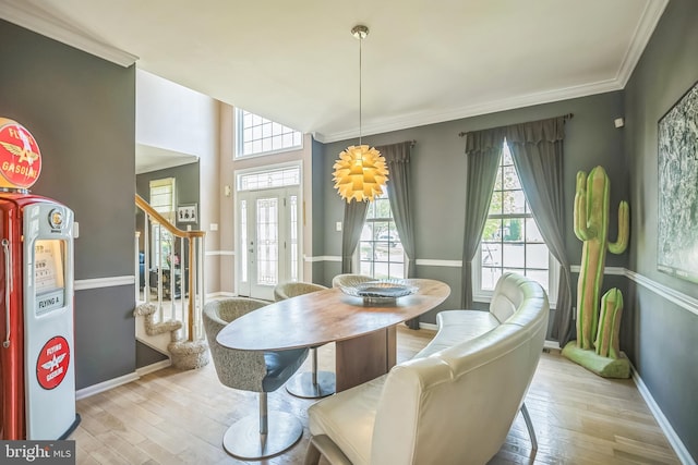22 Sawgrass Dr, Mount Holly, NJ 08060 - dining area with plenty of natural light, stairway, wood finished floors, and ornamental molding