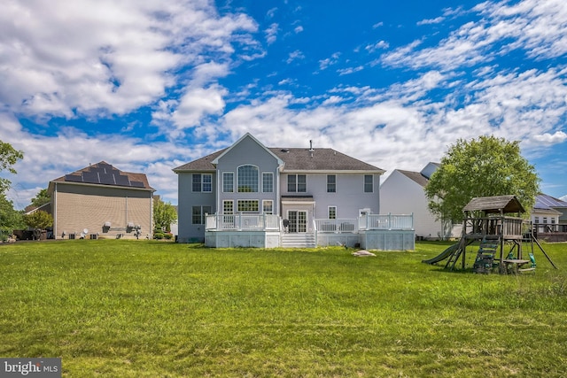 22 Sawgrass Dr, Mount Holly, NJ 08060 - rear view of property with a playground and a yard