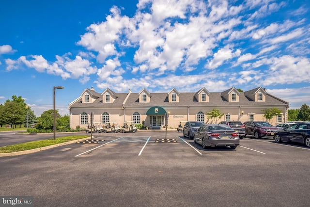 22 Sawgrass Dr, Mount Holly, NJ 08060 - view of building exterior with uncovered parking