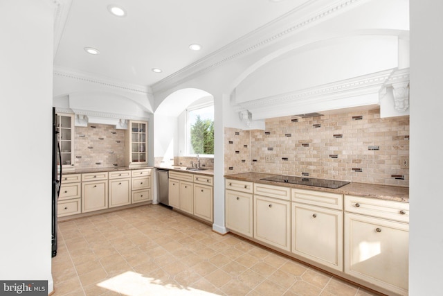 kitchen featuring cream cabinets, black electric cooktop, ornamental molding, arched walkways, and backsplash