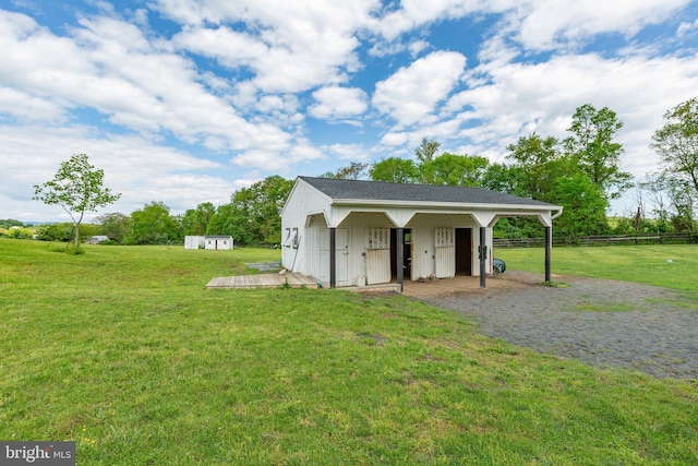view of outbuilding with an outbuilding