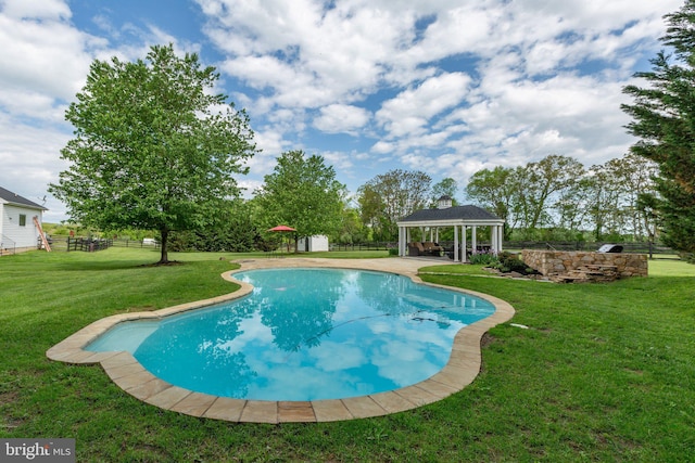 swimming pool with a gazebo and a patio
