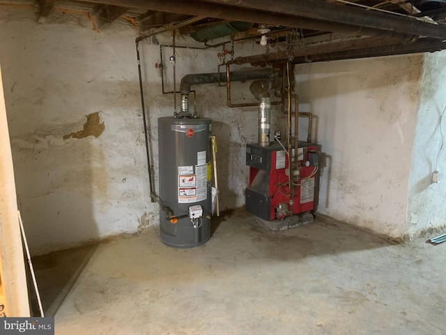 utility room with water heater and a heating unit
