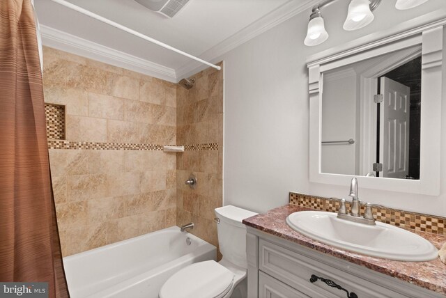 full bathroom with ornamental molding, toilet, shower / bath combo, and vanity