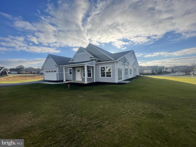 8 Springhaven Ct Unit 242, Palmyra, PA 17078 - view of property exterior featuring a garage, a yard, and driveway