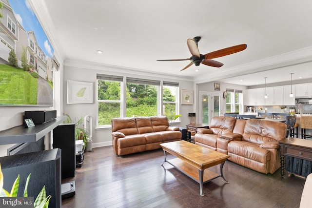 living area with healthy amount of natural light, ceiling fan, recessed lighting, dark wood-style floors, and ornamental molding