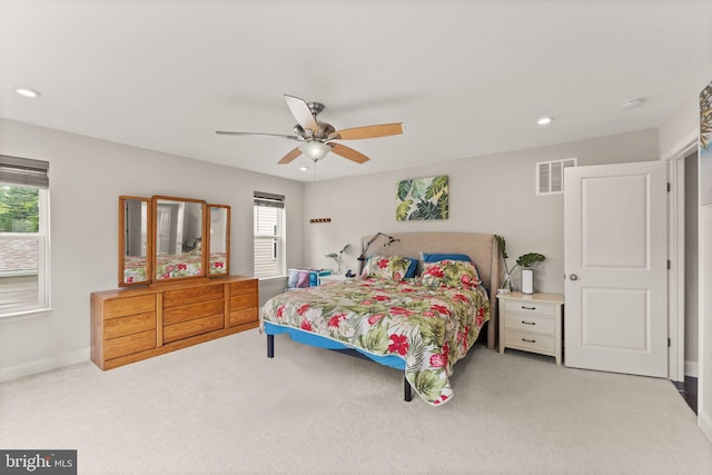 carpeted bedroom with ceiling fan, recessed lighting, and baseboards