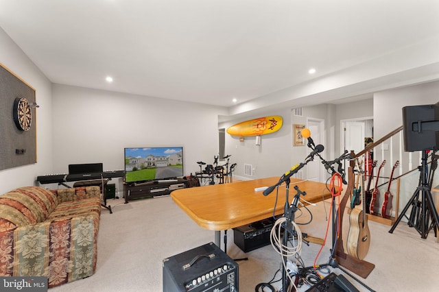 workout room with carpet floors and recessed lighting