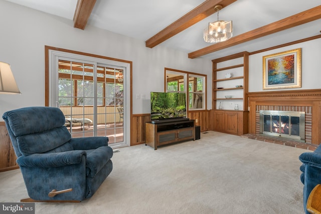 8 Botany Ct, North Potomac, MD 20878 - living area featuring beam ceiling, a wainscoted wall, light colored carpet, a chandelier, and a fireplace