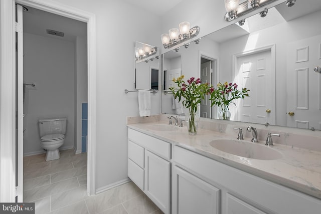 8 Botany Ct, North Potomac, MD 20878 - bathroom featuring double vanity, toilet, tile patterned floors, and baseboards