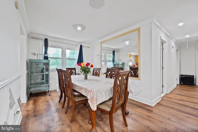 8904 Madison St, New Carrollton, MD 20784 - dining space featuring attic access, light wood-style flooring, ornamental molding, baseboards, and recessed lighting