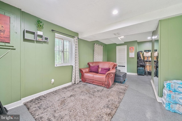 8904 Madison St, New Carrollton, MD 20784 - living area with baseboards, speckled floor, and recessed lighting