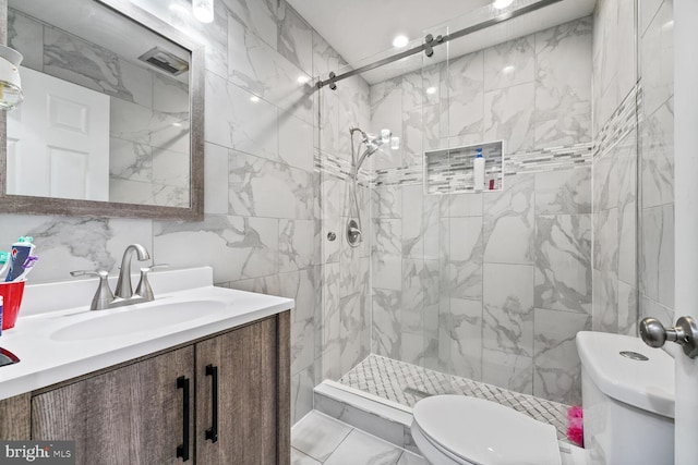 8904 Madison St, New Carrollton, MD 20784 - full bathroom featuring toilet, tile walls, a shower stall, vanity, and marble finish floors