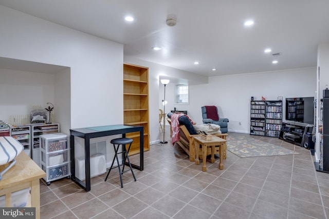 living room with recessed lighting, tile patterned flooring, and baseboards