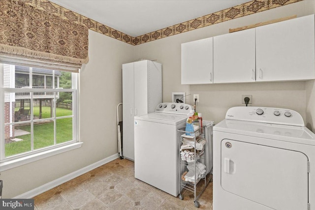 2218 W Greenleaf Dr W, Frederick, MD 21702 - laundry room featuring independent washer and dryer, cabinet space, and baseboards