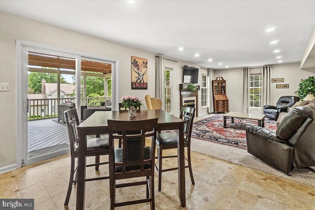 2218 W Greenleaf Dr W, Frederick, MD 21702 - dining area with recessed lighting, plenty of natural light, and a fireplace