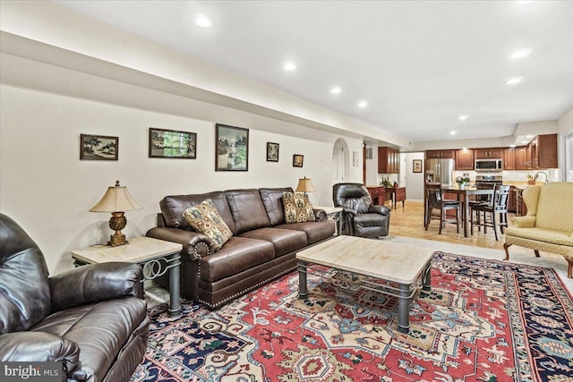 2218 W Greenleaf Dr W, Frederick, MD 21702 - living room featuring arched walkways and recessed lighting