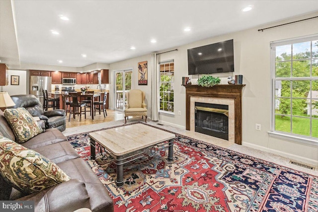2218 W Greenleaf Dr W, Frederick, MD 21702 - living area featuring recessed lighting, a high end fireplace, and baseboards