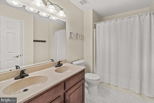 2218 W Greenleaf Dr W, Frederick, MD 21702 - bathroom with toilet, double vanity, and tile patterned floors