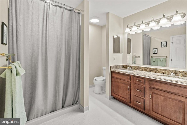 2218 W Greenleaf Dr W, Frederick, MD 21702 - full bathroom featuring double vanity, tile patterned floors, toilet, and a shower with curtain