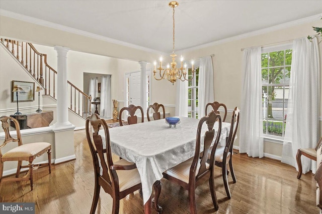2218 W Greenleaf Dr W, Frederick, MD 21702 - dining room featuring light wood-style flooring, a chandelier, baseboards, stairway, and ornamental molding