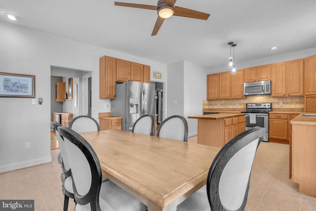 9420 River View Rd, Broomes Island, MD 20615 - dining area featuring a ceiling fan, baseboards, recessed lighting, and light tile patterned floors