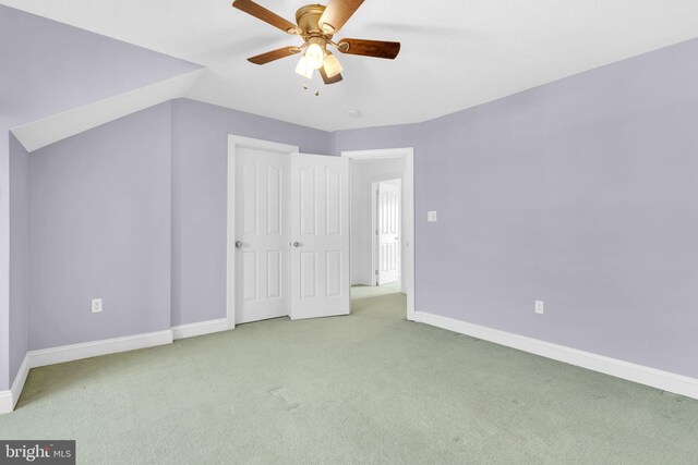 9420 River View Rd, Broomes Island, MD 20615 - unfurnished bedroom featuring carpet, baseboards, and ceiling fan