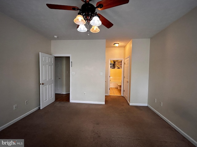 331 Lora Dr, Woodstock, VA 22664 - unfurnished bedroom with carpet floors, baseboards, ensuite bath, and a ceiling fan