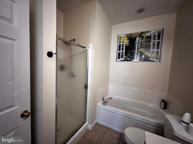 331 Lora Dr, Woodstock, VA 22664 - bathroom with tile patterned flooring, a stall shower, a jetted tub, and toilet