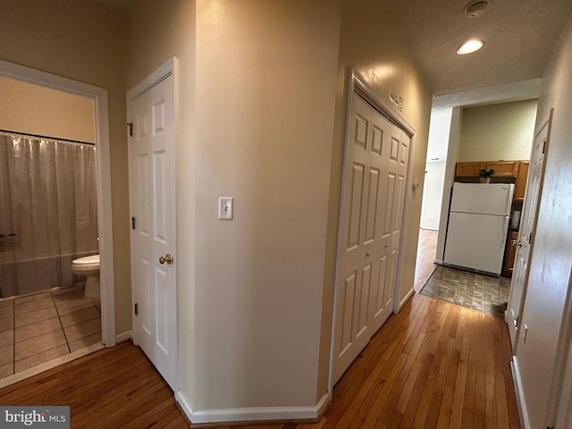 331 Lora Dr, Woodstock, VA 22664 - corridor with hardwood / wood-style flooring and baseboards