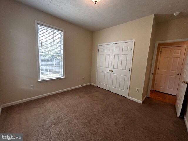 331 Lora Dr, Woodstock, VA 22664 - unfurnished bedroom featuring carpet, baseboards, and a closet
