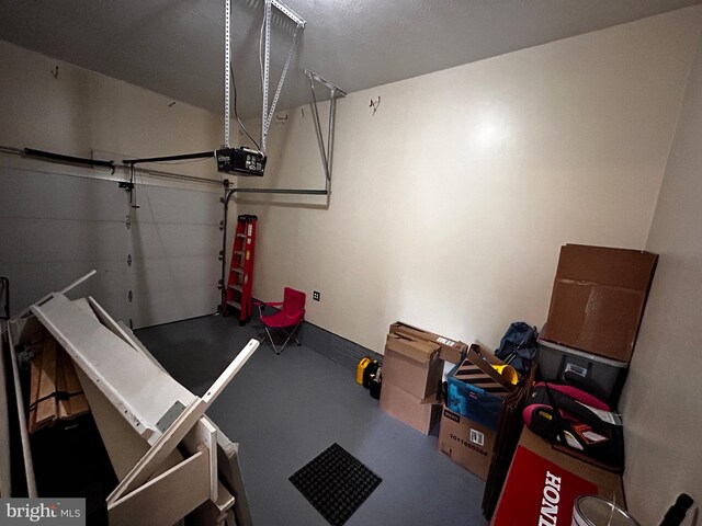 331 Lora Dr, Woodstock, VA 22664 - garage featuring a garage door opener