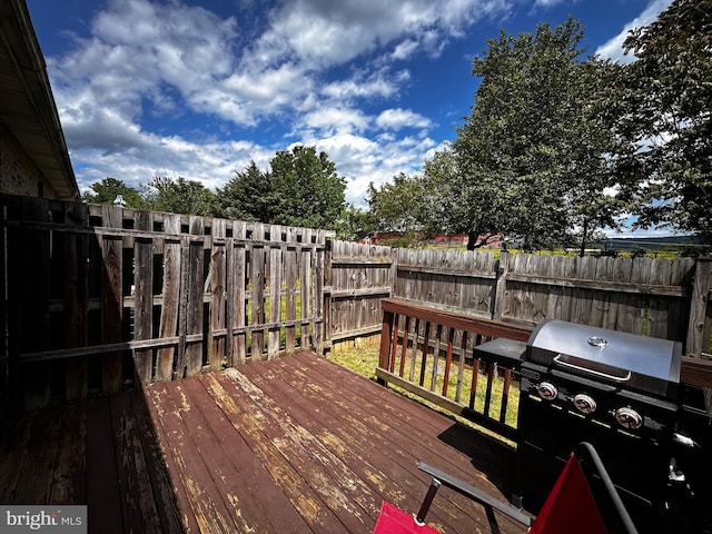 331 Lora Dr, Woodstock, VA 22664 - wooden terrace featuring a grill and a fenced backyard