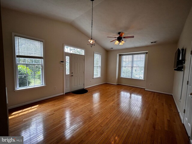331 Lora Dr, Woodstock, VA 22664 - foyer entrance featuring healthy amount of natural light, lofted ceiling, wood-type flooring, a ceiling fan, and baseboards