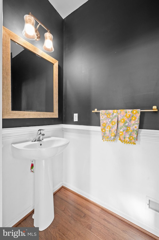 bathroom featuring wood finished floors