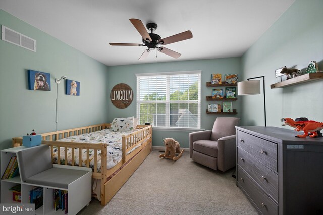 bedroom with carpet, ceiling fan, and baseboards