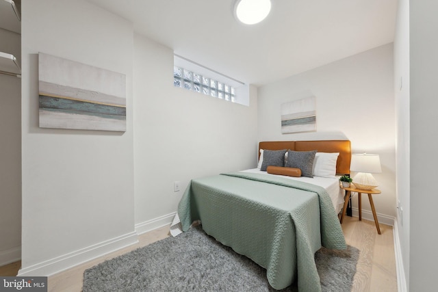 1427 Rhode Island Ave NW Unit L01, Washington, DC 20005 - bedroom with baseboards and wood finished floors