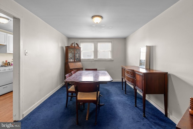 dining space with baseboards