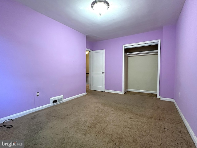 1206 Cedarcroft Rd, Baltimore, MD 21239 - unfurnished bedroom with carpet, baseboards, and a closet