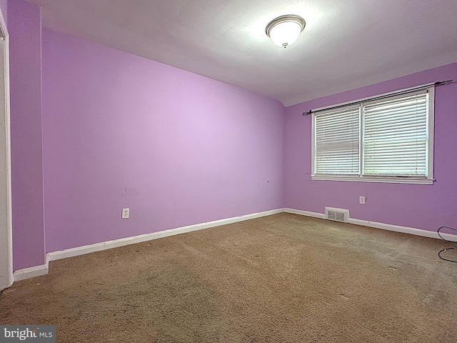 1206 Cedarcroft Rd, Baltimore, MD 21239 - carpeted empty room featuring baseboards