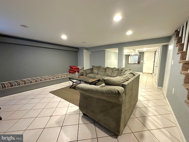 1206 Cedarcroft Rd, Baltimore, MD 21239 - living area featuring light tile patterned flooring and recessed lighting