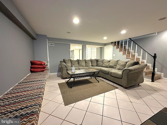 1206 Cedarcroft Rd, Baltimore, MD 21239 - living room with stairs, light tile patterned flooring, recessed lighting, and baseboards
