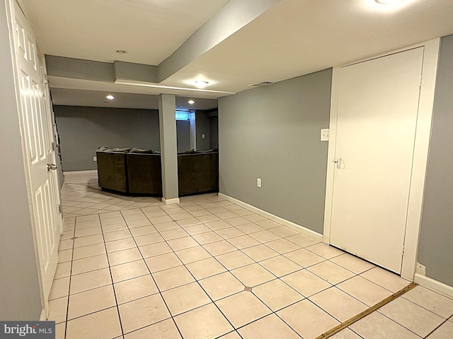 1206 Cedarcroft Rd, Baltimore, MD 21239 - kitchen with light tile patterned floors, baseboards, and recessed lighting