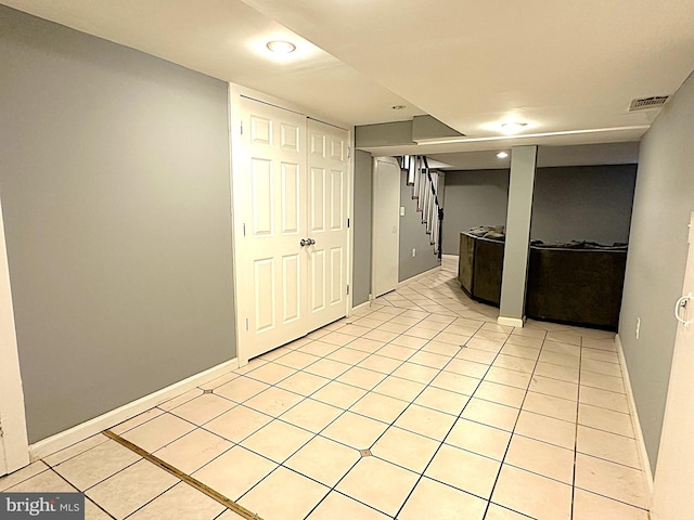 1206 Cedarcroft Rd, Baltimore, MD 21239 - kitchen with light tile patterned floors, baseboards, and recessed lighting
