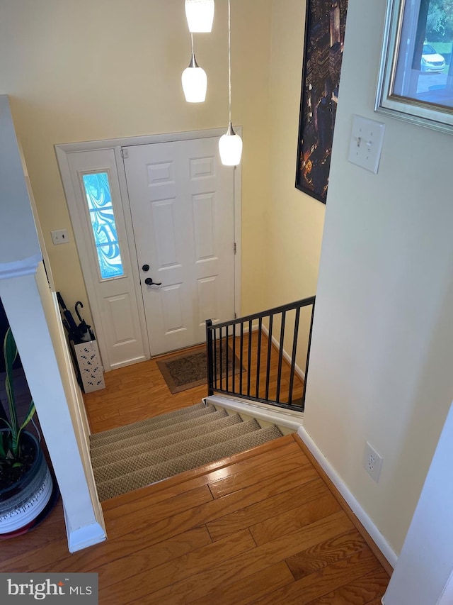 99 Exeter Ct, Shepherdstown, WV 25443 - foyer with wood finished floors, baseboards, and stairs