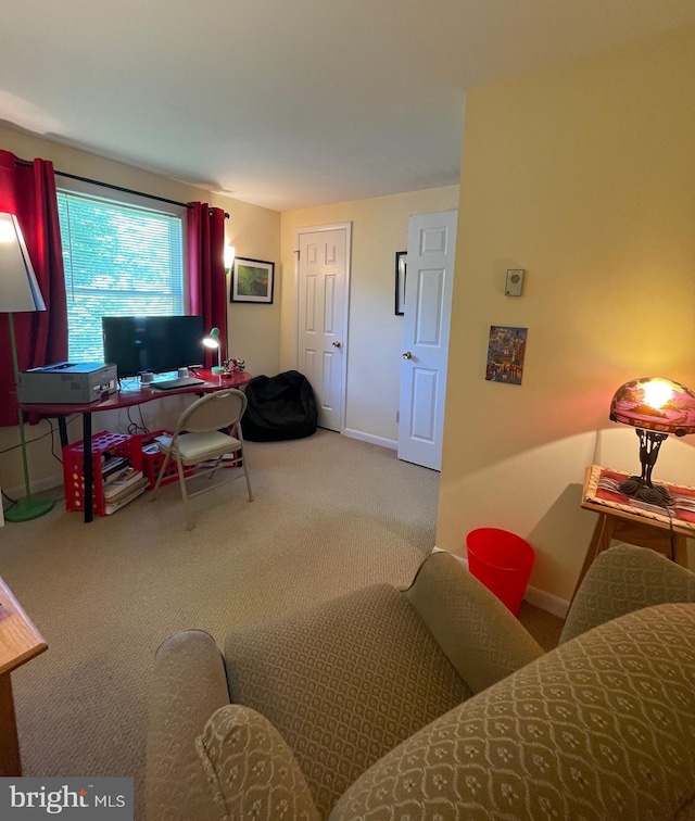 99 Exeter Ct, Shepherdstown, WV 25443 - carpeted living room featuring baseboards and an office area